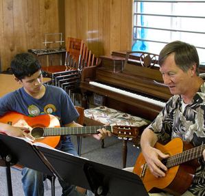 Malcolom Peterson teaches Guitar at Skagit Family Learning Center